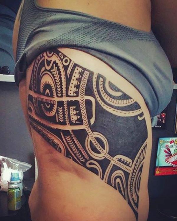 That's so amazing black ancient tribal tattoo designs on the back side make a girl look different