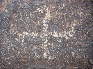 Swastika rock carving near Heard Scout Pueblo, Phoenix, Arizona.