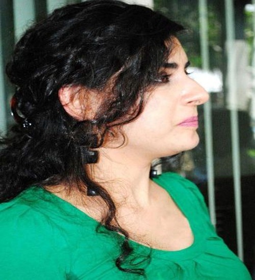 Archana Veda Looking in Green Top