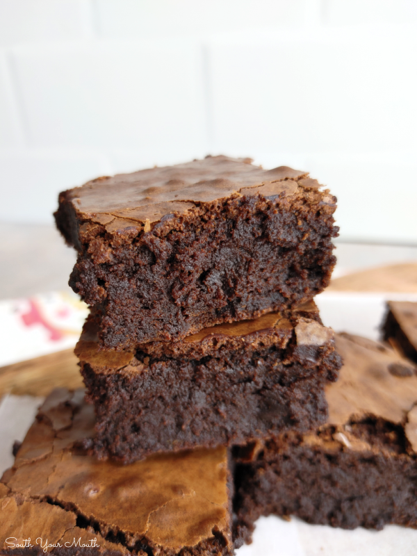 Crackle Top Fudge Brownies! A decadent recipe for thick, fudgy homemade brownies with glossy, crackly tops and intense chocolate flavor.