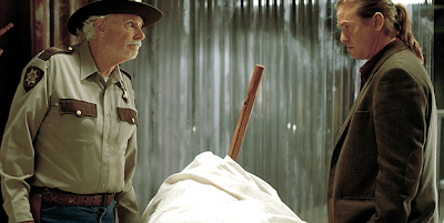 Val Kilmer Hall Baltimore and Bruce Dern as Sheriff LaGrange inspect a corpse, Twixt, directed by Francis Ford Coppola