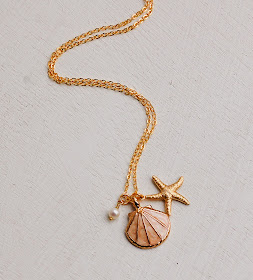 https://www.etsy.com/listing/223991572/sea-shell-necklace-gold-shell-necklace?ref=shop_home_active_1&ga_search_query=shell