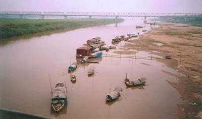 The Red river- peach silk ascross Hanoi