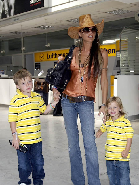 CELEBRITY STYLE TRANSFORMATION Victoria Beckham at the airport with jeans and cowboy hat