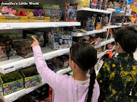 Children looking at toys in Asda