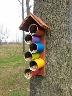 Casa para passaros de latas