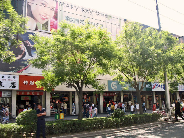 shops on Beijing street with shoppers