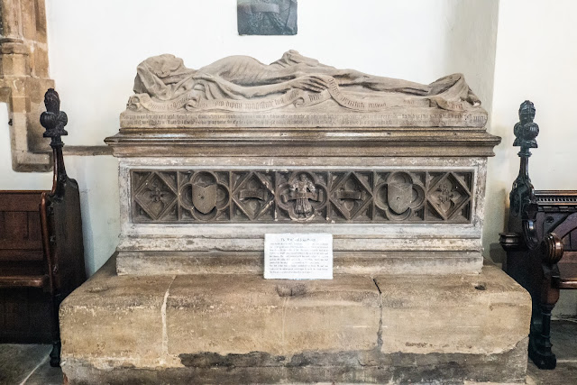 Cadaver tomb of a John Baret