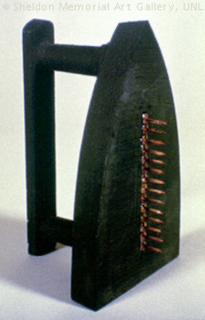 Image: found object sculpture by Man Ray, "Iron"