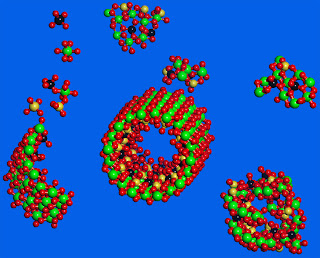 Computer-generated graphic shows a single-walled metal oxide nanotube assembling itself from small molecules and amorphous nanoparticles dissolved in water. Image courtesy of Suchitra Konduri.