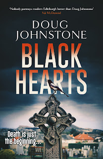 Cover for book “Black Hearts” by Doug Johnstone. An ornate stone Celtic cross grave monument in the foreground, behind, a bench and in the distance, further gravestones. Behind them, suburban semis and – just visible in the far distance – Salisbury Crags and Arthur’s Seat, hills in Edinburgh. Above the author’s name, “Nobody portrays Edinburgh better than Doug Johnstone – Val McDermaid”