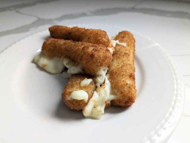 Trader Joe's Breaded Mozzarella Cheese Sticks close up.