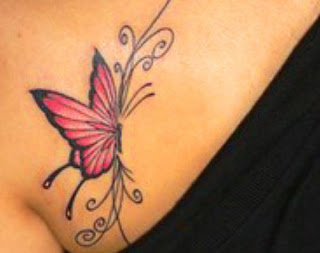 red butterfly tattoo on breast girl