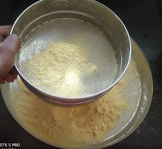 Sifting besan flour