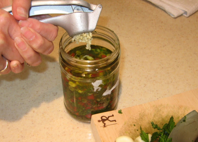 Making the marinade for marinated cheese image