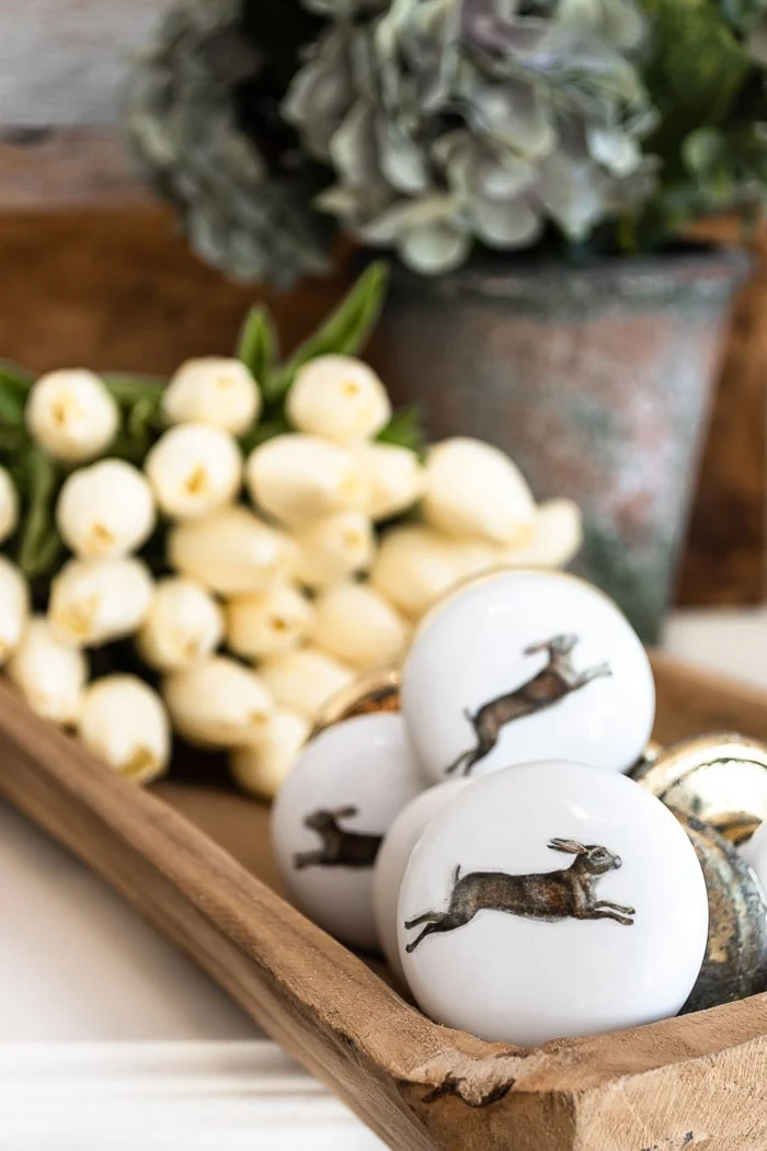 vintage rabbit decals in wood dough bowl with tulips