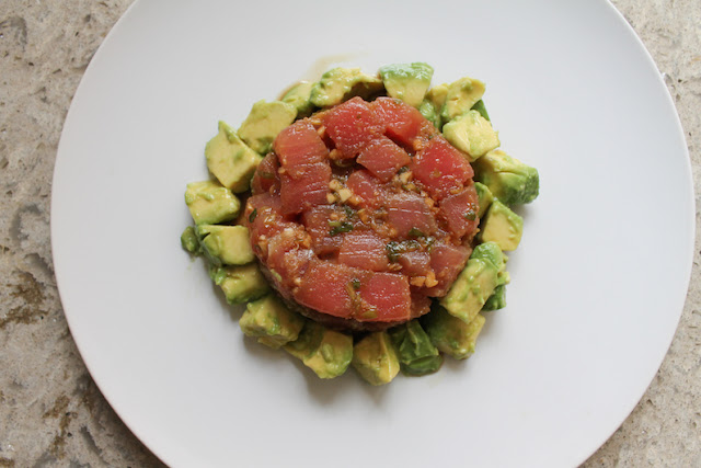 Food Lust People Love: Ginger Sesame Tuna Tartare is a light and flavorful starter made with good quality tuna, marinated briefly in ginger, soy, sesame oil, rice vinegar and honey. Sprinkle on some black sesame seeds for color and crunch.