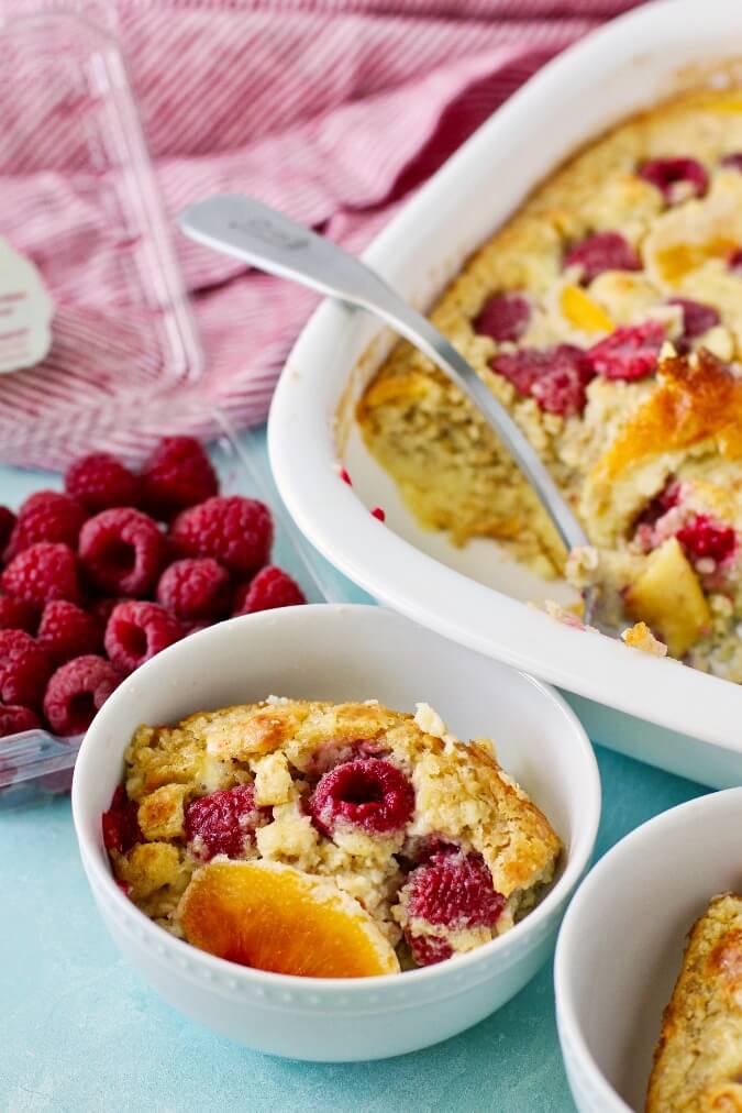 Yellow cake baked oatmeal with peaches and raspberries