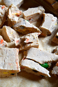 Fudge made with white chocolate and marshmallow creme packed with oreos, M&M's and candy corn