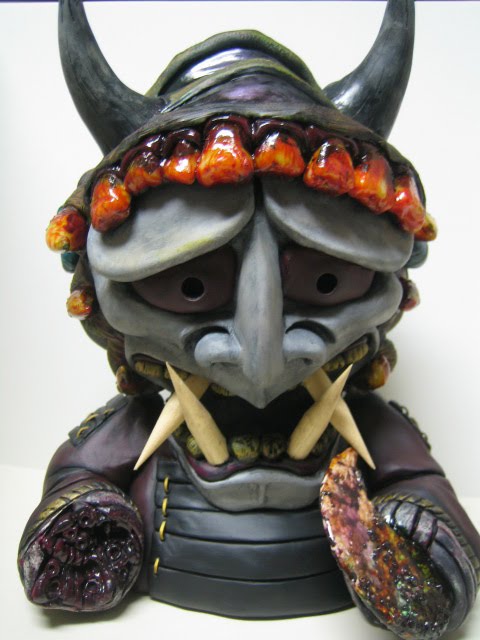 J Ryu sculpted the oni mask on