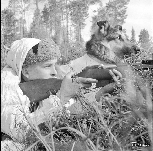 Finnish soldier and dog 25 April 1942 worldwartwo.filminspector.com