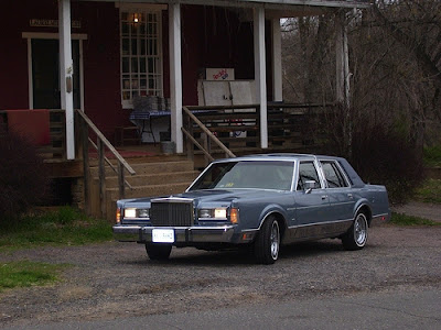 Exactly like a wanted militant. Town Car, just like mine.