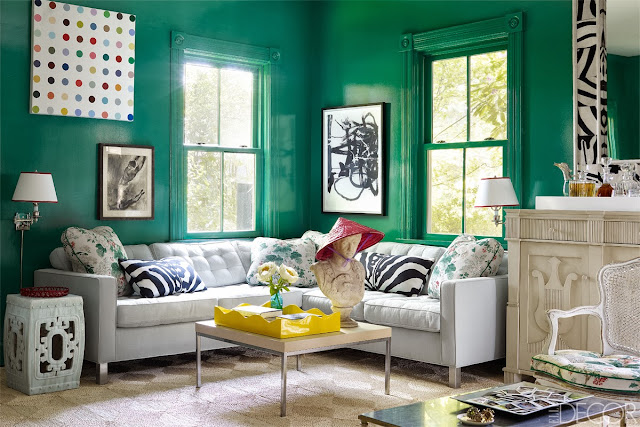High gloss green living room in Oscar PR Girl's home with a mix of modern and traditional furniture