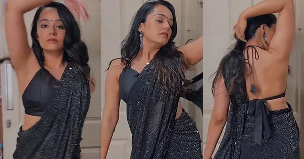 Apoorva Arora backless black saree curvy actress