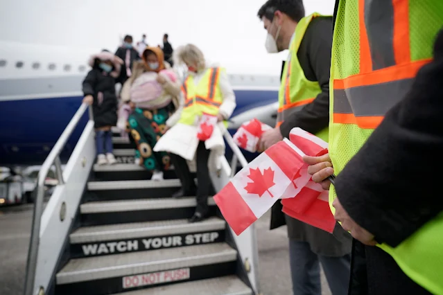 The Arrival of 10,000 Afghan Refugees Marked by Canada