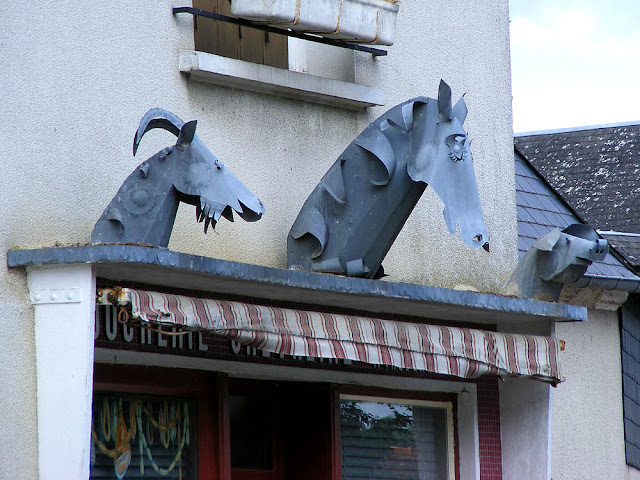 Metal sculptures on an old horse meat butcher's, Loir et Cher, France. Photo by Loire Valley Time Travel.