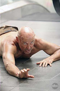 John Locke fell on ground crawling hurt Lost Island Terry O'Quinn