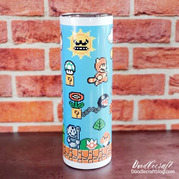 How to Make a Mario Brothers Sublimation Tumbler   Have you seen the Mario Brothers Movie yet?   We saw it last week and enjoyed it! It was full of nostalgia and bright colors. The story line was so simple, it's perfect for all ages.  I was feeling nostalgic about my days playing Super Mario Bros 3 and thought I'd do a sublimation tumbler.     Learn how easy it is to make a Mario Brothers Sublimaton Tumbler using Hitprex Tumbler Heat Press.
