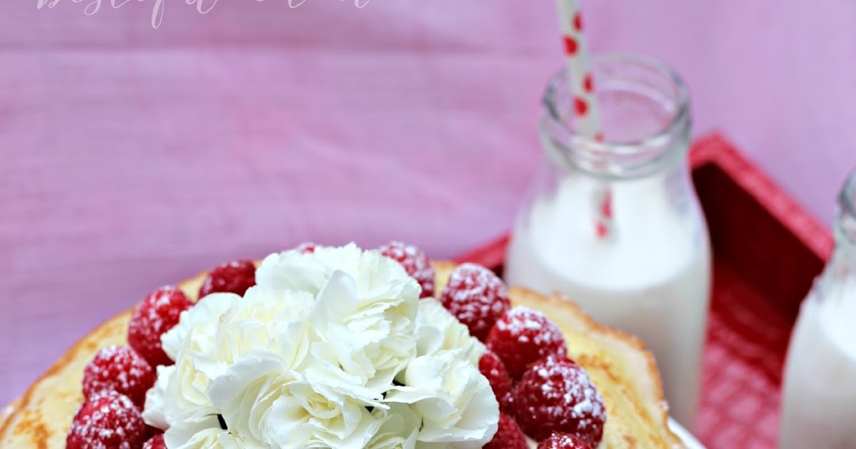 Ombre Crepe Cake with Vanilla Pastry Cream and Raspberries 