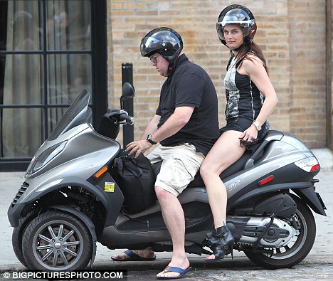 Hitching a ride and her hemline Brooke Shields hikes up her skirt round 