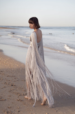 Chana Marelus collection-fringe trend-wedding dress-Astrid Silver thread gown with belt, boat neckline, and fringe sleeves-Weddings by KMich-Philadelphia PA