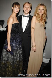 Rosie Huntington-Whiteley, Jan Olesen, and Lily Donaldson, all in Burberry.