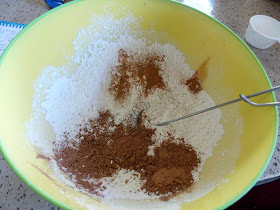 Adding dry ingredients to bowl for chocolate zucchini cake from www.anyonita-nibbles.com
