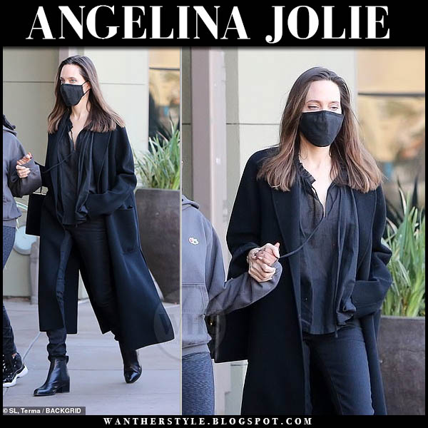 Angelina Jolie in black coat, black jeans and black ankle boots