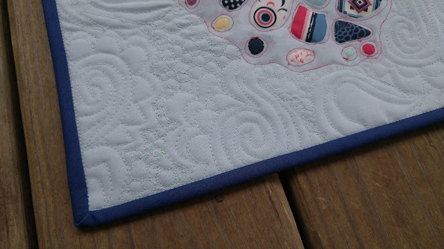 Reverse applique butterfly mini quilt