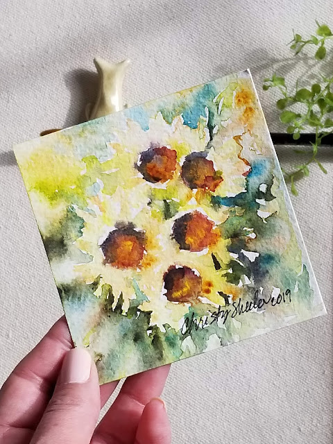  "Soakin' In the Warmth of Sun" Sunflowers in watercolor 4"x4" by Christy Sheeler, artist 2019.