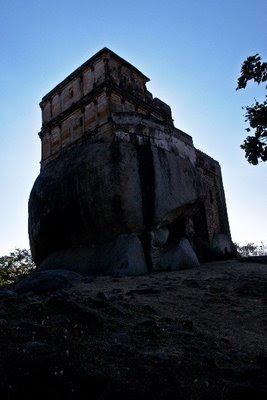   It has been 11 years since my trip to Jabalpur. And things may have changed quite a bit since then. May be the city is much more crowded. May be it is much more tourist friendly, with all the efforts of Madhya Pradesh Tourism. May be the historical monuments are much better maintained. May be it is much safer now. I will need to revisit the place to find out but till then, let me focus on how I remember the place. I think it is time for a time-turner post on Jabalpur.      The Time-Turner series is my opportunity to pen down the lingering memories and impressions of a place I have visited. It helps me relive the experience a bit and also reflect upon the aspects of the place that stood out the most to me. For more Time-Turner posts, follow this link: The Time-Turner Series.      The first thought that comes to my mind when I think of Jabalpur was that the city was hot even in winter, and that it was quite clean. I remember taking autos everywhere. They were easily available and the autowallahs were quite knowledgeable too.        Another lasting impression about Jabalpur is huge rocks that seemed to be everywhere we visited. At some places they were igneous rocks, at others they were metamorphic. In fact at many places, even historical monuments seemed to have been built so that these rocks fit right in. Very inclusive of the environment.      The prime example of this was Madan Mahal. Madan Mahal Fort was built around 11 A.D and was the pleasure palace for Madan Singh, the tenth Gond King and son of Rani Durgawati. During her reign, the fort was used as a watchtower. The fort has several interesting buildings and one can easily spend hours exploring this place. My only suggestion would be to go there in a group and when its light. Do not carry anything too expensive. The place is a little secluded and sometimes, anti-social elements hang out here.      The other interesting rock I saw was the balancing rock. This is one large igneous rock balancing itself precariously on another. The surface area of their connect is just a few square inches, and yet the rock has survived centuries and several strong earthquakes. If you are visiting Jabalpur, I would definitely recommend you visit this place as well. It is very close to Madan Mahal.       The next rocky place we saw was bhedaghat. This is a ravine where the river Narmada has been cutting through white marble rocks since ancient times. This is a beautiful place and I would recommend spending at least half a day here. You can take a boat ride that would refresh you and entertain you. The guide on the boat have a script that is pretty amusing.       Apart from these rocky places, Dhuandhar falls are another place that one must visit when you go to Jabalpur. The falls are massive and grand. And the sound, you need to hear it to believe it. The falls are very close to Bhedaghat and can be covered in the same trip.       Also worth visiting is the Chausanth Yogini temple, also enroute to Bhedaghat. It is an amazing place actually. If you are interested in photography, this place is for you. You will find some really interesting idols, beautiful architecture here. However, I do remember climbing countless stairs to get to the temple complex. I also remember that there was absolutely no one else here. A quiet and beautiful place. What more can you ask for?        Overall, my memories of Jabalpur are quite pleasant. I also remember meeting a distant relative of mine here. He belongs to Jabalpur. I don't know why but I have started relating to him much more ever since I visited his city back then in 2009.      Stay tuned for another Time-Turner post on Madhya Pradesh. Coming soon. 