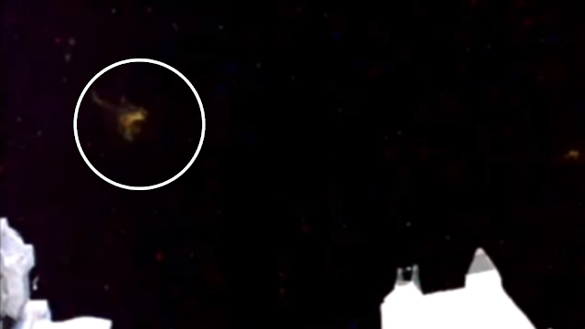 Here's a fantastic screenshot showing the UFOs just starting to appear at the ISS.