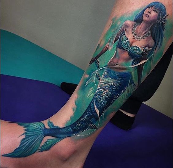 colourful-realistic-mermaid-leg-tattoo