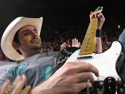 brad paisley and wife. rad paisley and wife kiss.