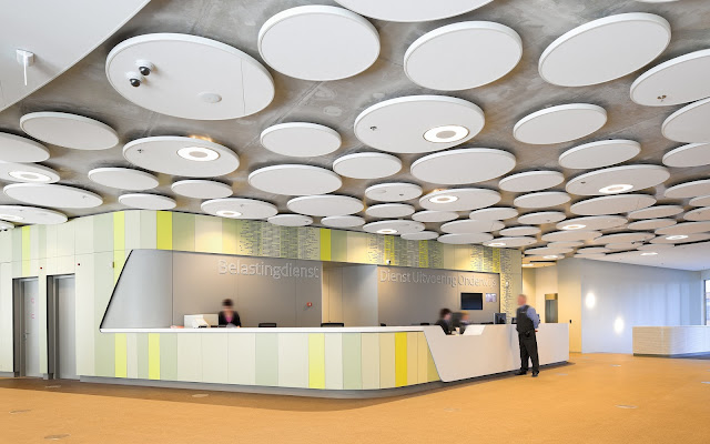 Picture of the lobby with concrete circles on the ceiling