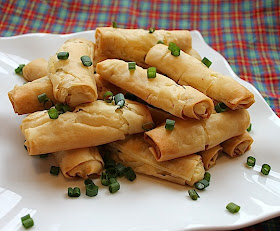 Food Lust People Love: Crispy, crunchy filo pastry baked around a lovely green onion, feta and ricotta cheese filling makes these little filo cheese rolls the perfect snack.