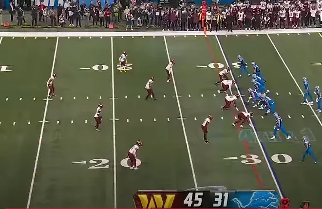 Detroit Lions and Washington Commanders players during a playoff game