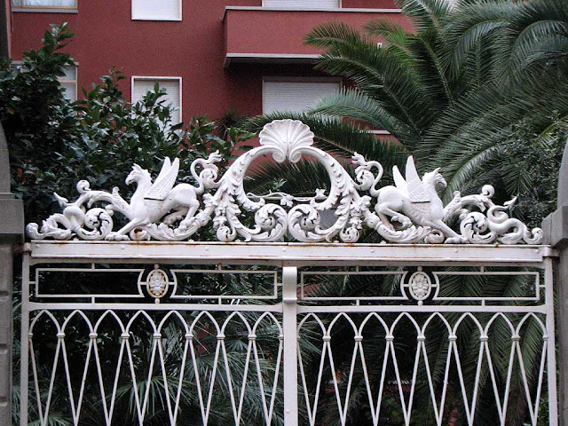 Pegasus fights a Chimera, gate in via Roma, Livorno