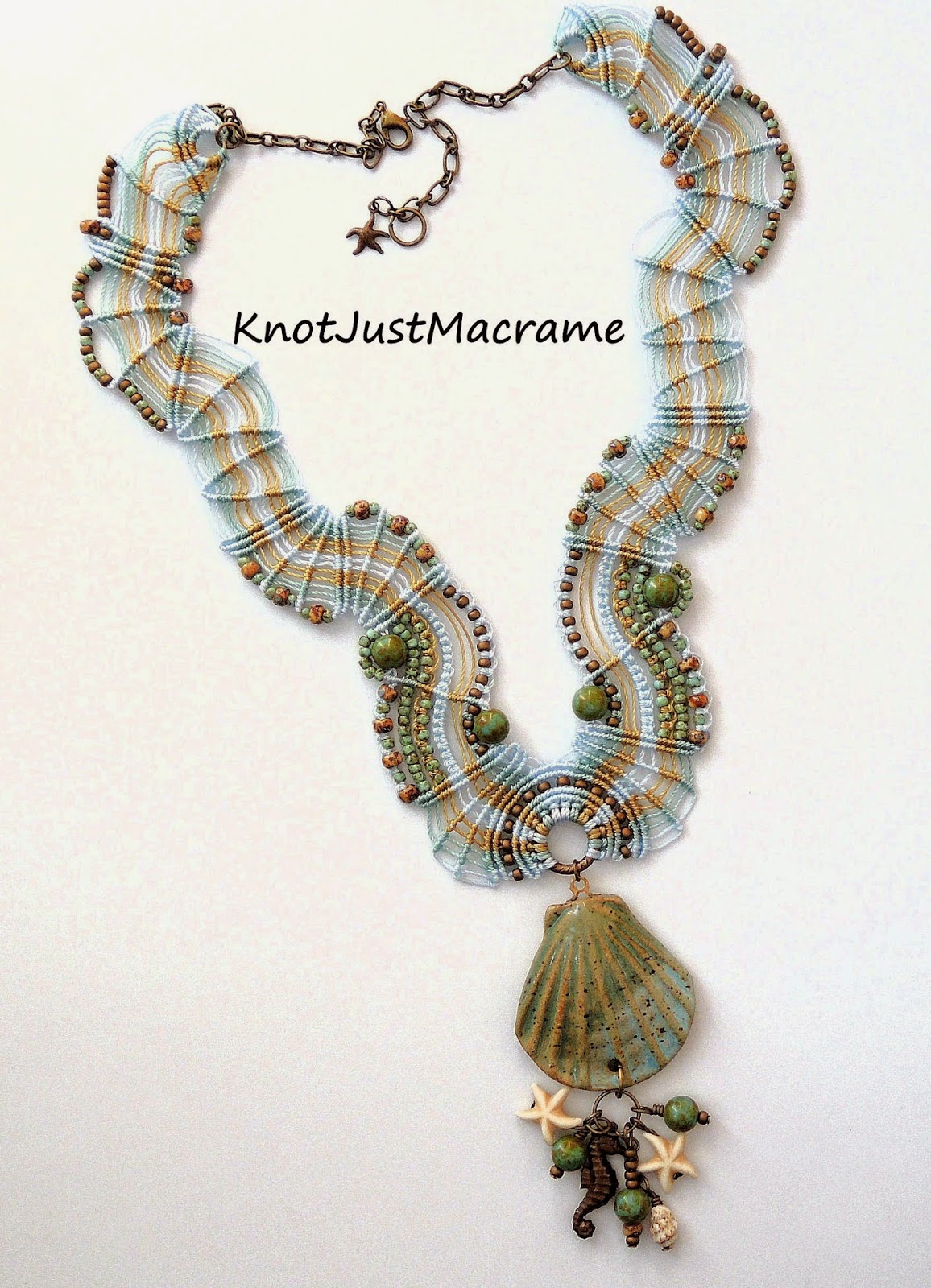 Micro macrame necklace by Sherri Stokey with ceramic shell pendant by Firefly Design Studio
