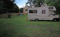 My dog and my motorhome on a campsite